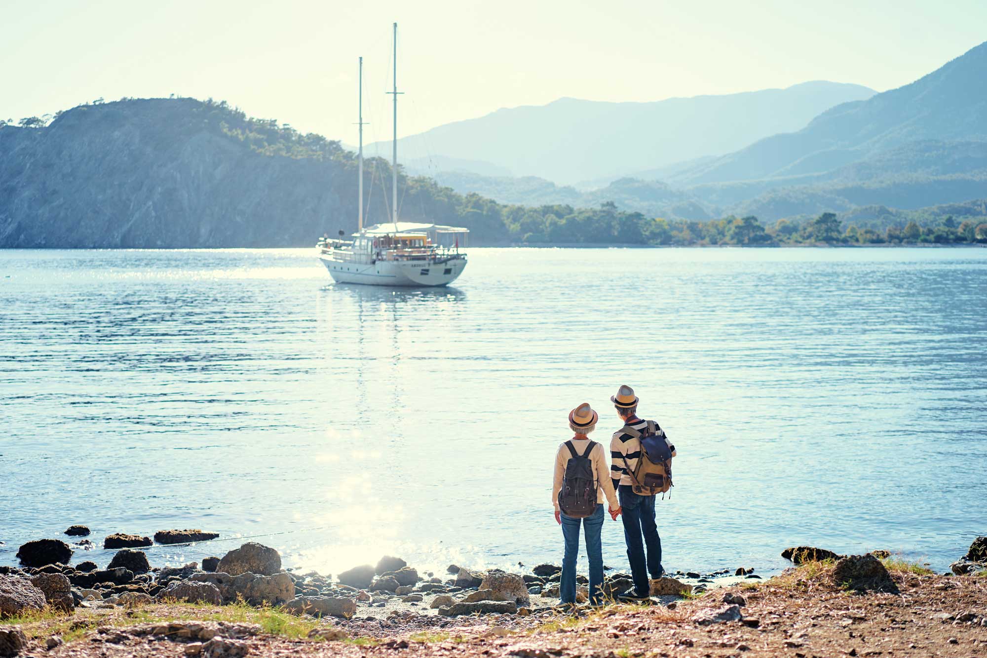 retired couple by a lake