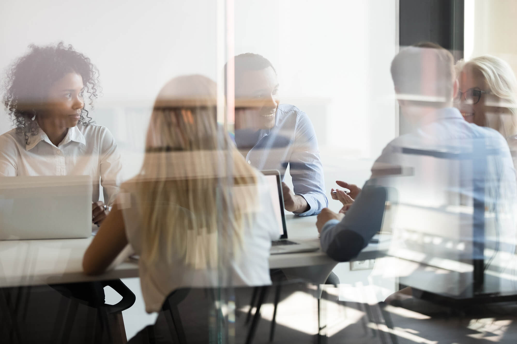 a group of professionals in a meeting